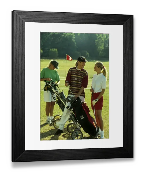 Framed Print : Golfers and golfers on the golf course