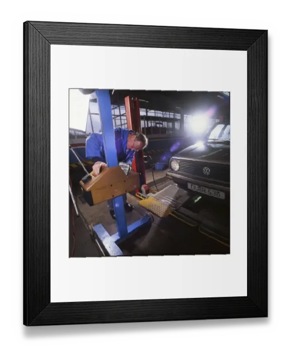 Framed Print : The Technical Inspection Association (TUeV) during the inspection of motor vehicles on 16 Framed Print : The Technical Inspection Association (TUeV) during the inspection of motor vehicles on 16