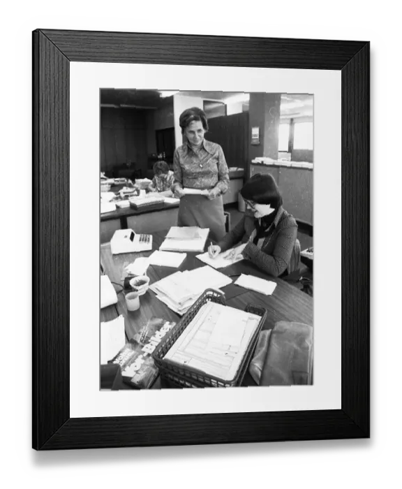 Framed Print : Employee in an accounting department on 24