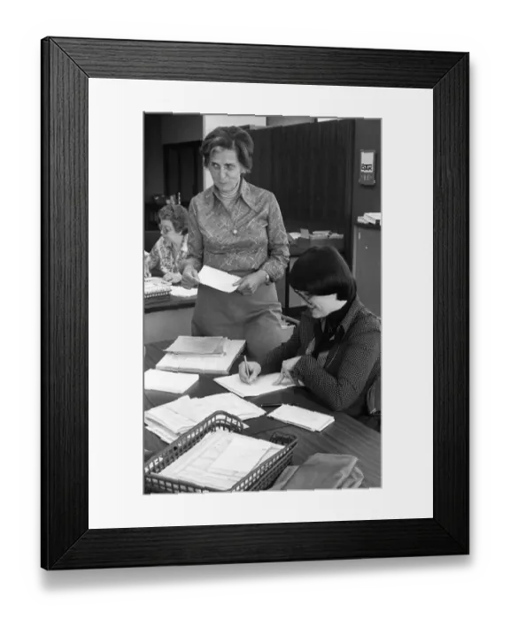Framed Print : Employee in an accounting department on 24
