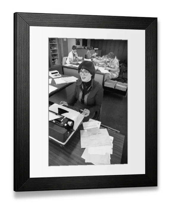 Framed Print : Employee in an accounting department on 24