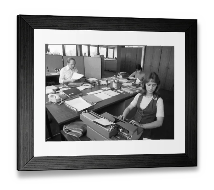 Framed Print : Employee in an accounting department on 24