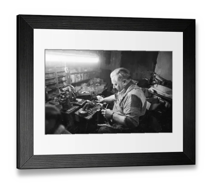 Framed Print : In the workshop of a Schumacher as a sole trader on 12
