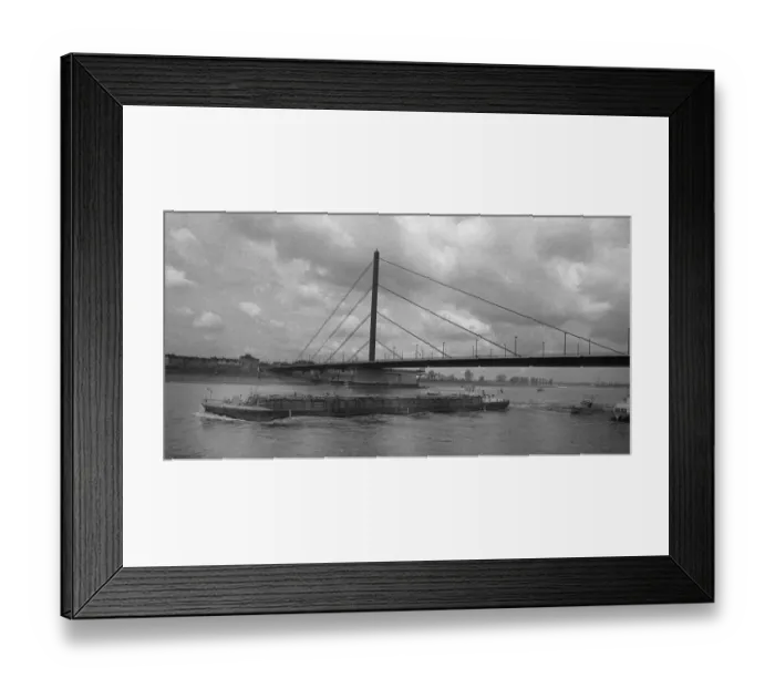 Framed Print : The displacement of a Rhine bridge turned into a public festival in Duesseldorf on 07 Framed Print : The displacement of a Rhine bridge turned into a public festival in Duesseldorf on 07