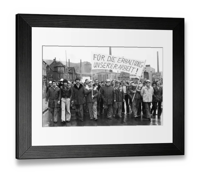 Framed Print : The concern for their jobs is written all over the faces of the workers