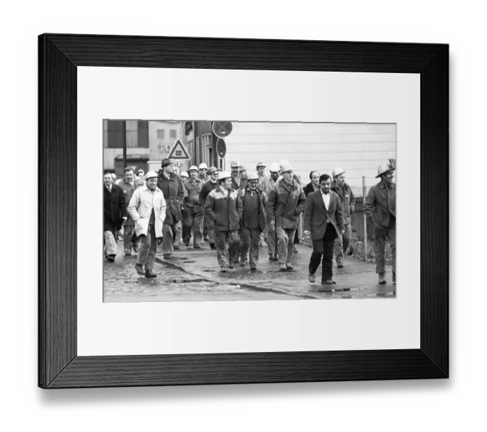 Framed Print : The concern for their jobs is written all over the faces of the workers