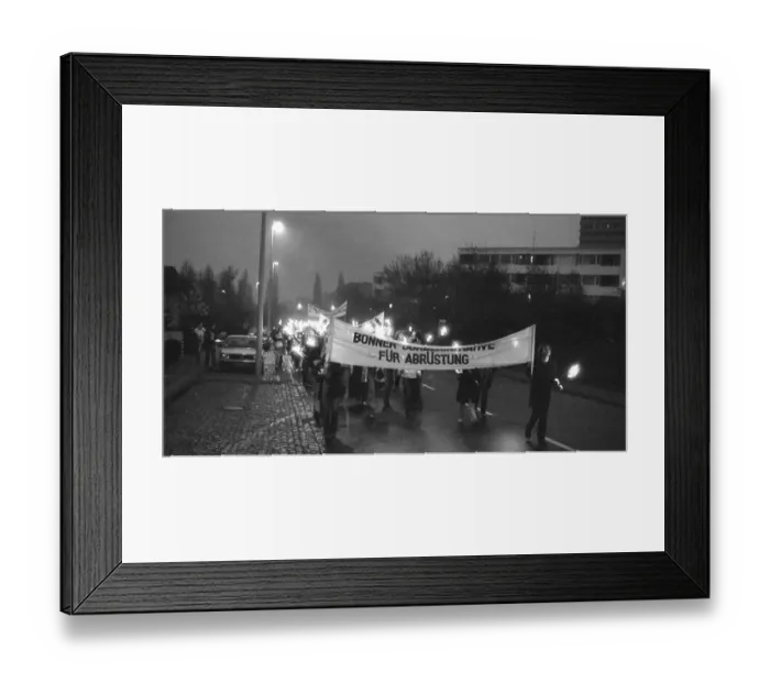 Framed Print : A torchlight procession for disarmament and against nuclear missiles moved to the Ministry of Defence at Hardthoehe