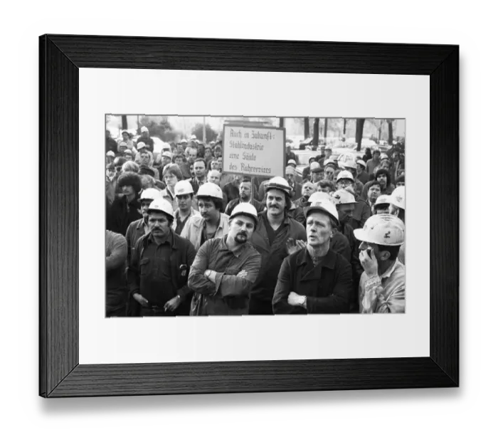Framed Print : About 5000 steel workers of the Hoesch AG took to the streets to protest for the preservation of their jobs during a