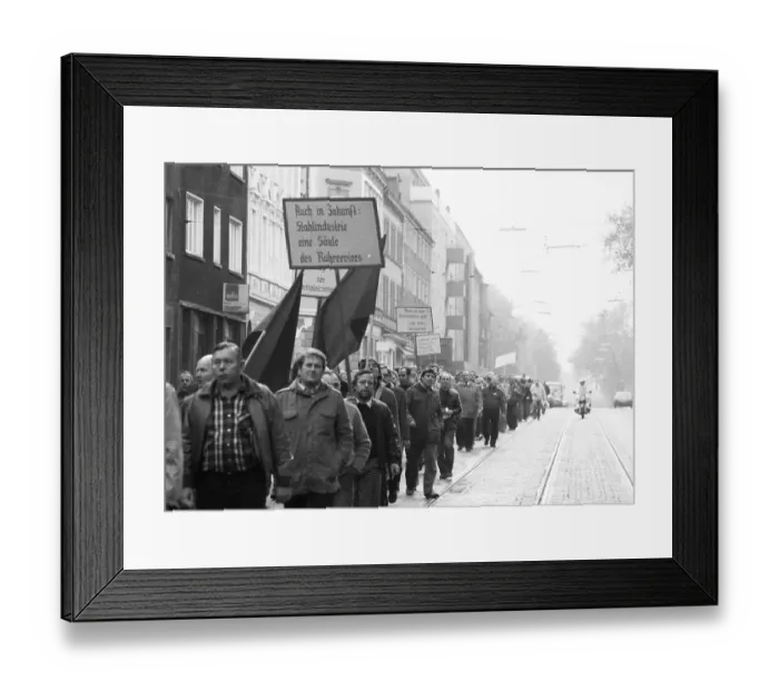 Framed Print : About 5000 steel workers of the Hoesch AG took to the streets to protest for the preservation of their jobs during a