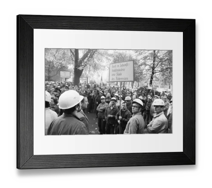 Framed Print : About 5000 steel workers of the Hoesch AG took to the streets to protest for the preservation of their jobs during a