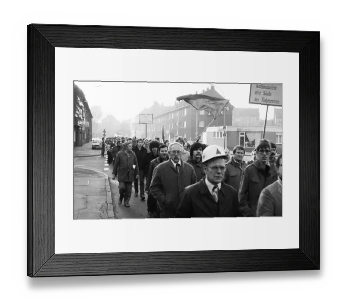 Framed Print : About 5000 steel workers of the Hoesch AG took to the streets to protest for the preservation of their jobs during a