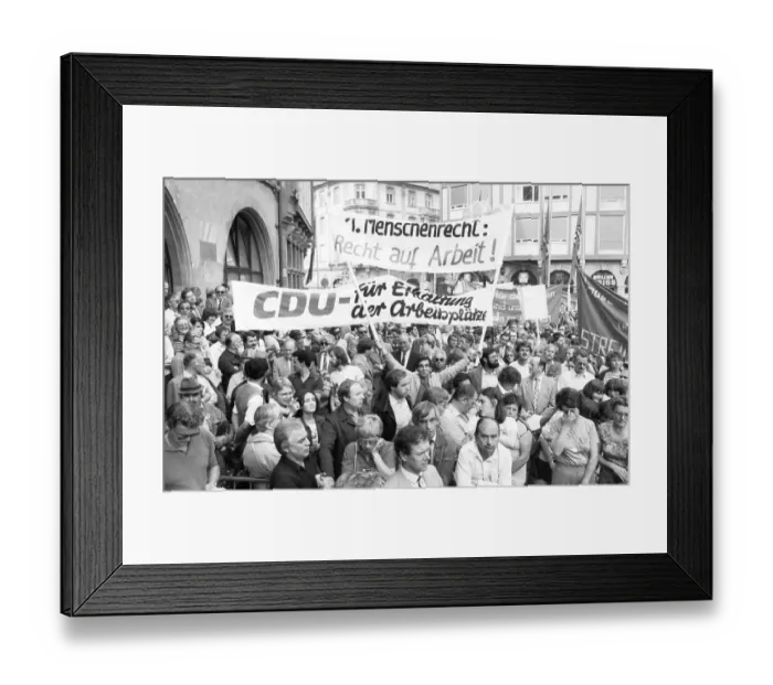 Framed Print : To secure their jobs, 6000 metalworkers of the Adler-Triumpf company took to the streets in protest in September 1981