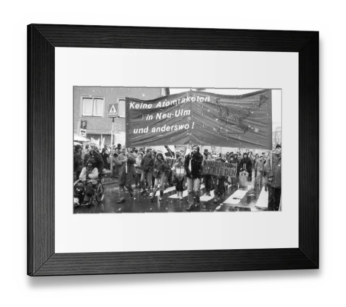 Framed Print : Peace movement demonstrates against missile bases despite heavy snowfall in December 1981