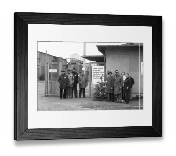 Framed Print : Worried about their jobs, workers and employees occupied their company