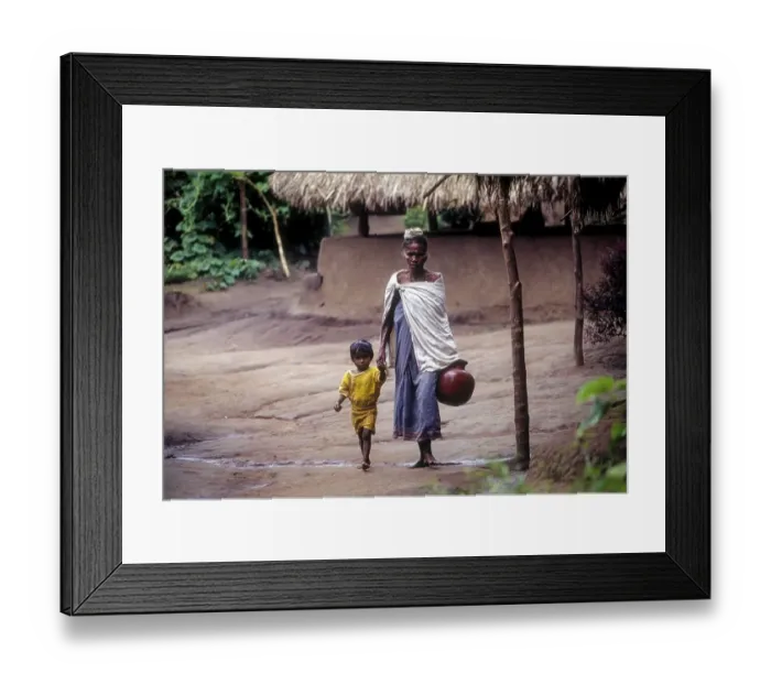 Framed Print : Jenu Kurumba Tribal with daughter at Nagarhole
