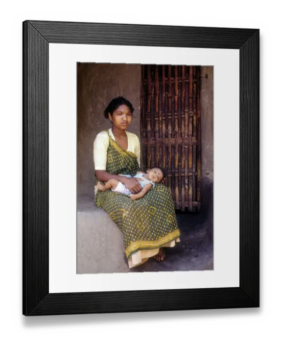 Framed Print : Jenu Kurumba tribal woman with her baby at Nagarhole