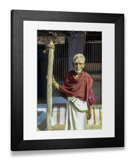 Framed Print : Brahmin old man holding stick in front of his Agraharam house Brahmin quarter at Sundarapandiapuram near Courtalam Framed Print : Brahmin old man holding stick in front of his Agraharam house Brahmin quarter at Sundarapandiapuram near Courtalam