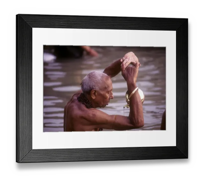 Framed Print : Morning oblation by a brahmin in Ganga Ganges at Varanasi Benaras Framed Print : Morning oblation by a brahmin in Ganga Ganges at Varanasi Benaras