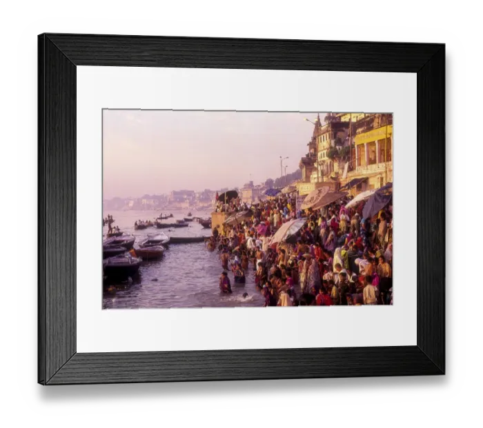 Framed Print : The day begins early on the ghats as a dip in the river ganga at sun rise is considered auspicious