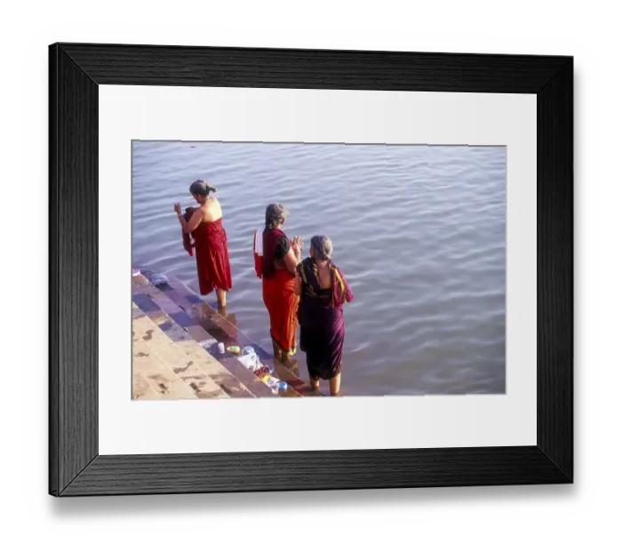 Framed Print : Women bathing in sacred River Ganga Ganges at Varanasi Benaras