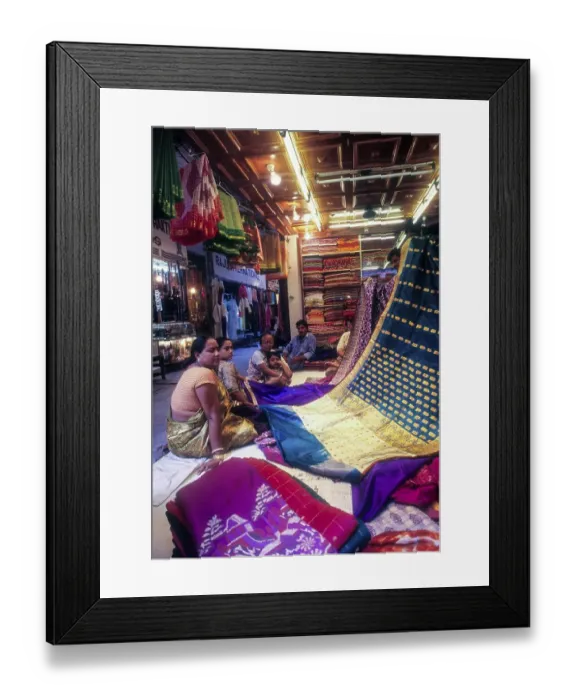 Framed Print : Banarasi Saries are sold in the crowded Kunjali area at Varanasi Benaras