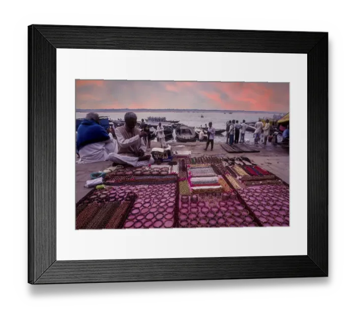 Framed Print : A man selling ornaments in front of Ganga Ganges River at Varanasi Benaras