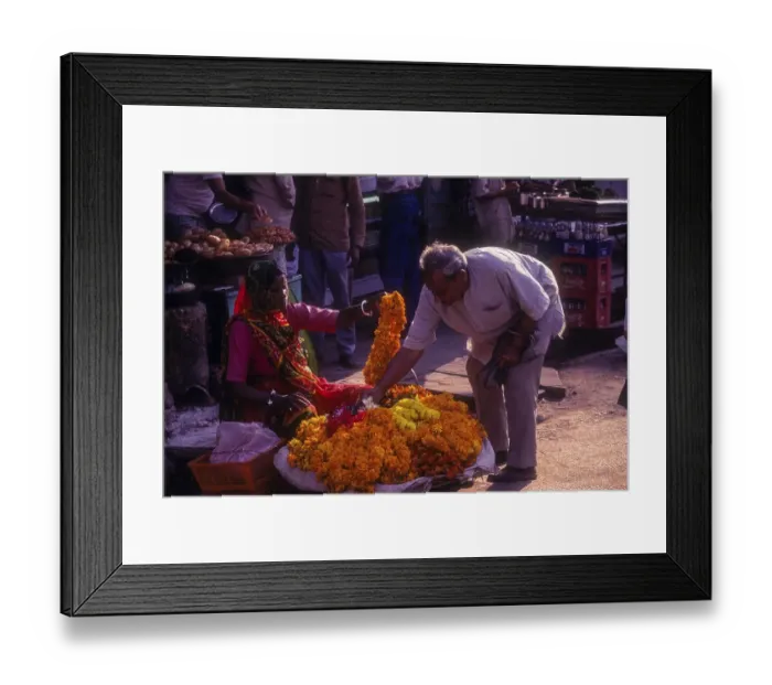 Framed Print : A woman selling mari gold flowers at Varanasi Benaras
