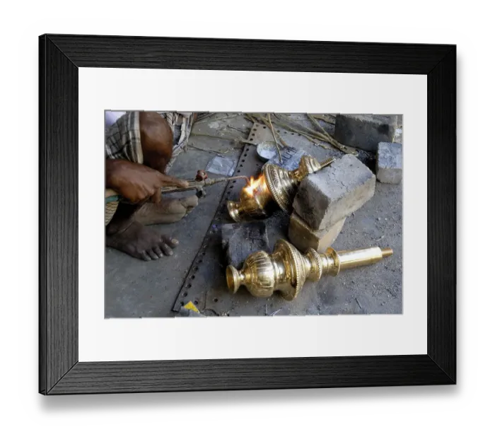 Framed Print : Artisan in the process of welding to make bronze oil lamp at NachiyarKoil Nachiyar Koil near Thanjavur Tanjore Framed Print : Artisan in the process of welding to make bronze oil lamp at NachiyarKoil Nachiyar Koil near Thanjavur Tanjore