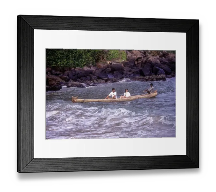 Framed Print : Tourists enjoying ride on Catamaran in the Arabian Sea at Kovalam beach near Thiruvananthapuram