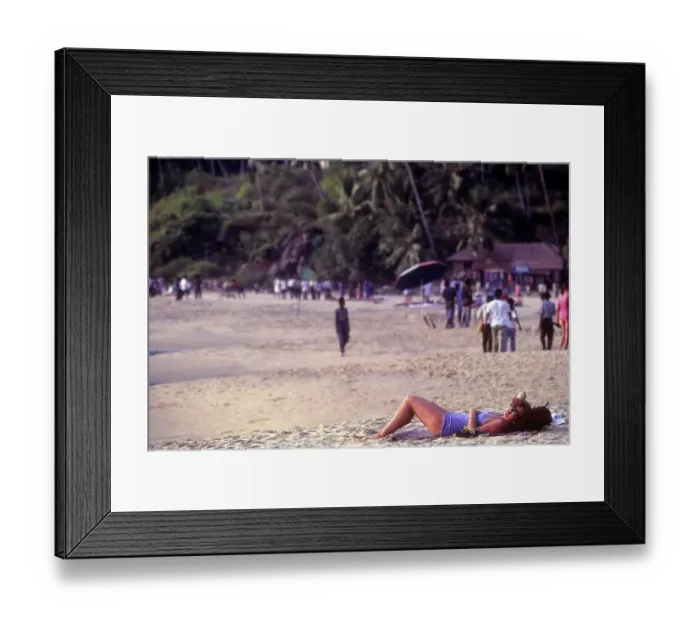 Framed Print : Sunbather at Kovalam beach near Thiruvananthapuram Trivandrum Framed Print : Sunbather at Kovalam beach near Thiruvananthapuram Trivandrum