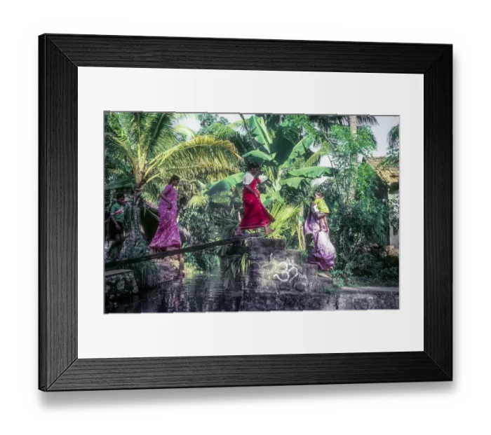 Framed Print : Women crossing Backwaters of Kerala through small wooden plank