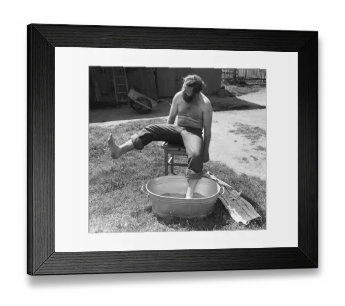 Framed Print : Man bathing his feet, Leipzig, GDR Framed Print : Man bathing his feet, Leipzig, GDR
