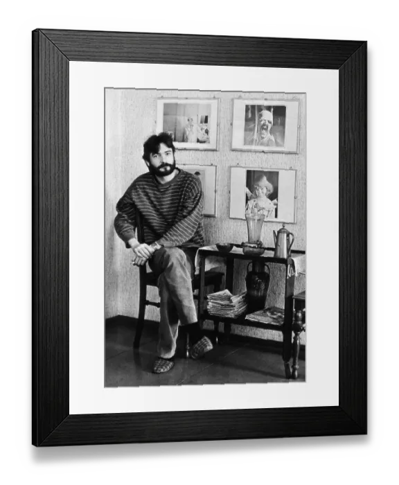 Framed Print : Young man with pictures of Helnwein Framed Print : Young man with pictures of Helnwein