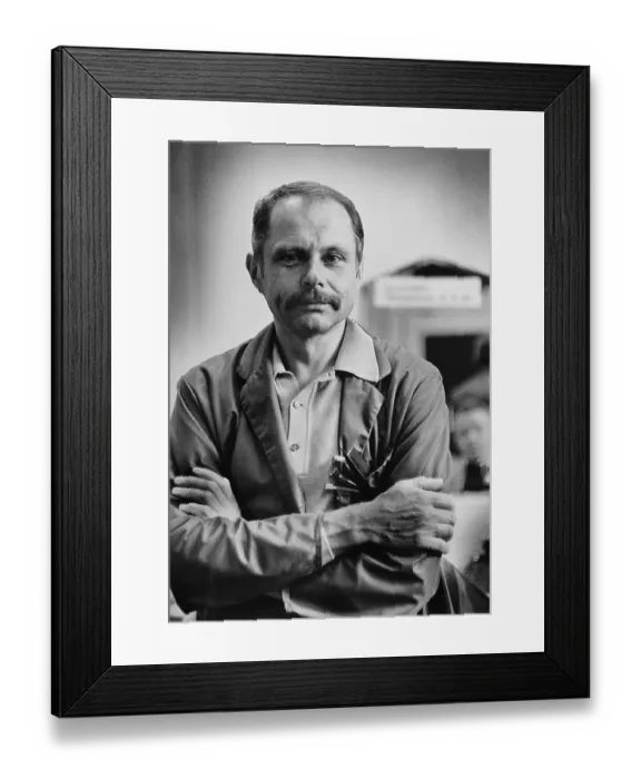 Framed Print : Master hairdresser in a salon, circa 1975