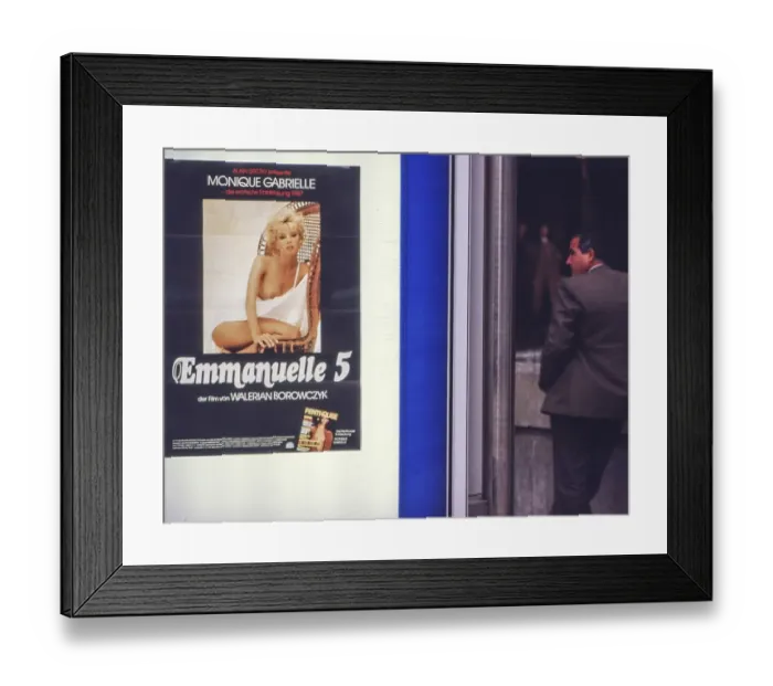 Framed Print : Film poster Emmanuelle 5 with Monique Gabrielle from 1987 in front of a sex cinema in the Hindenburg building
