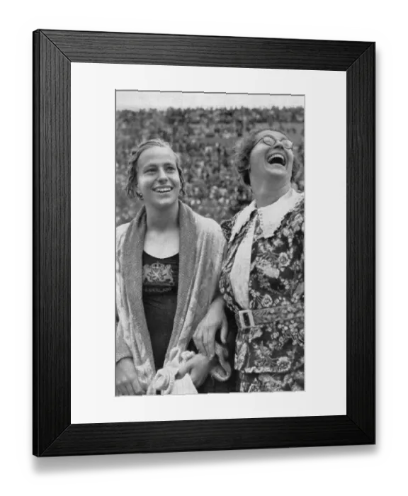 Framed Print : Dina Senff (Holland) and her coach are happy about winning the 100-metre backstroke