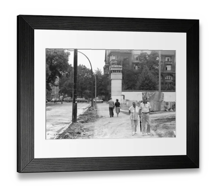 Framed Print : Remains of the Berlin Wall with a watchtower at the Heidelberger Strasse road Treptow and Neukoelln