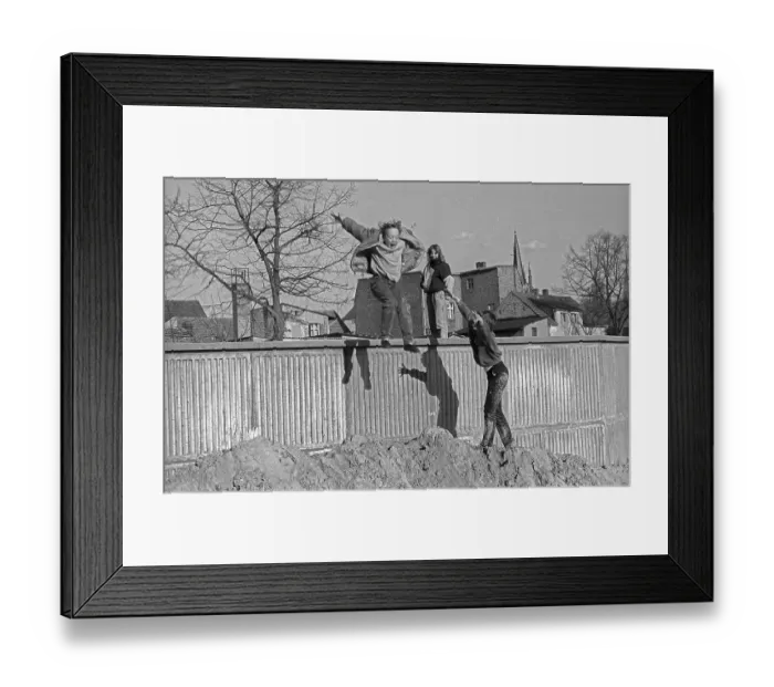 Framed Print : Germany, Werder, 23. 03. 1991, Children jumping off a wall
