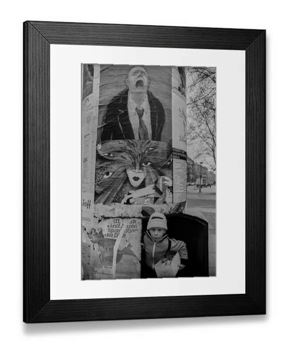 Framed Print : GDR, Berlin, 18. 03. 1989, child in an advertising pillar