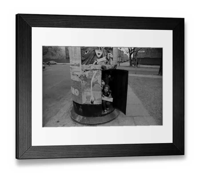 Framed Print : GDR, Berlin, 18. 03. 1989, children in an advertising pillar