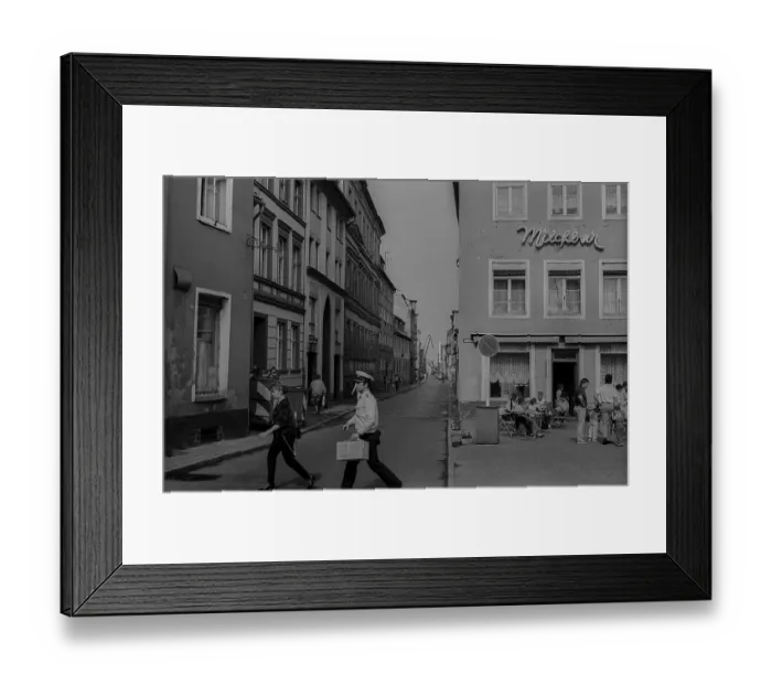 Framed Print : GDR, Stralsund, 9.6.1988, street scene with sailor in Stralsund Framed Print : GDR, Stralsund, 9.6.1988, street scene with sailor in Stralsund