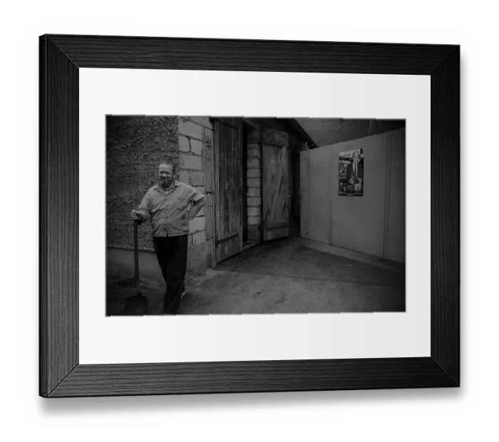 Framed Print : GDR, Berlin, 8.1.1990, street sweeper in Mulackstrasse