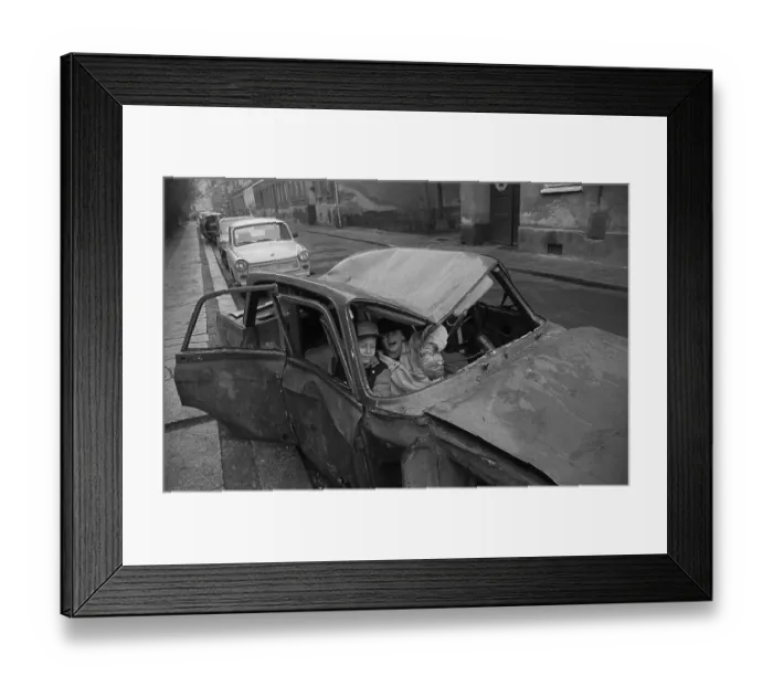 Framed Print : GDR, Berlin, 8.1.1990, children in a wrecked car in Steinstrasse Framed Print : GDR, Berlin, 8.1.1990, children in a wrecked car in Steinstrasse