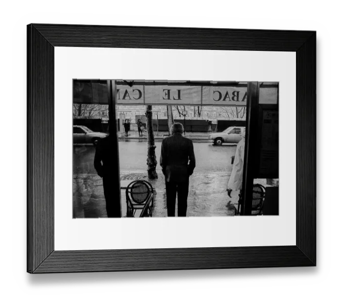 Framed Print : France, Paris, 22.03.1990, man in front of a restaurant