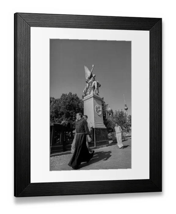 Framed Print : Germany, Berlin, 1 July 1991, Priest on the castle bridge