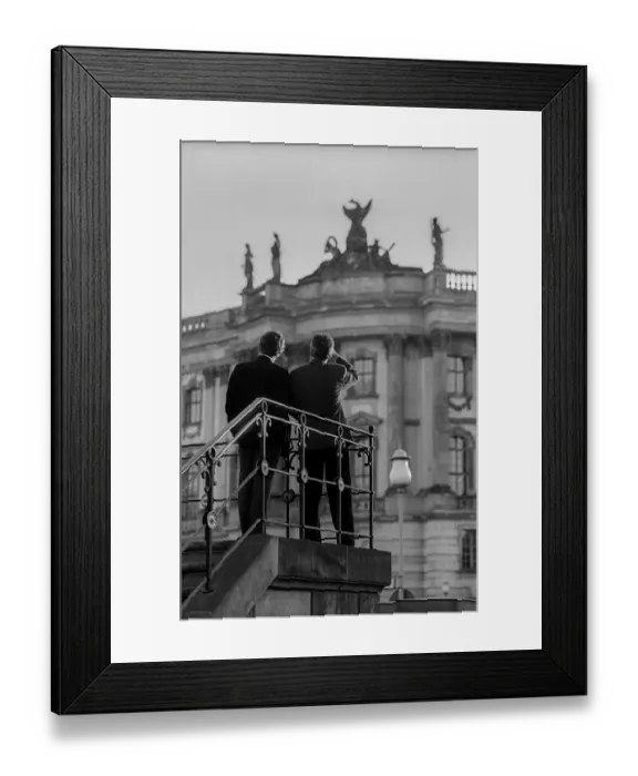 Framed Print : NGermany, Berlin, 19 May 1991, two men looking at the chest of drawers