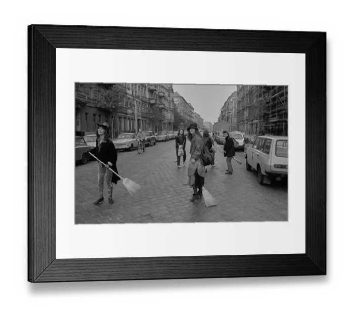 Framed Print : GDR, Berlin, 30.04.1990, Witches with brooms in Woerther Strasse