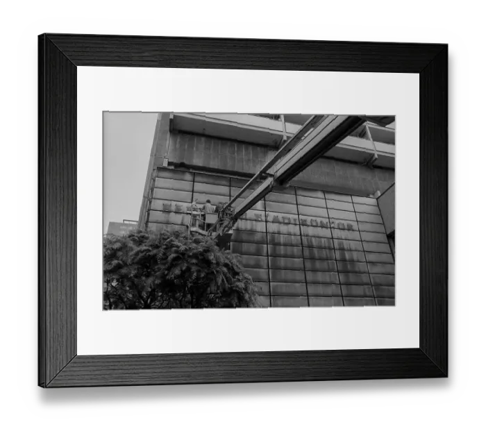 Framed Print : GDR, Berlin, 05.06.1990, Letters of the Berliner Stadtkontor are dismantled