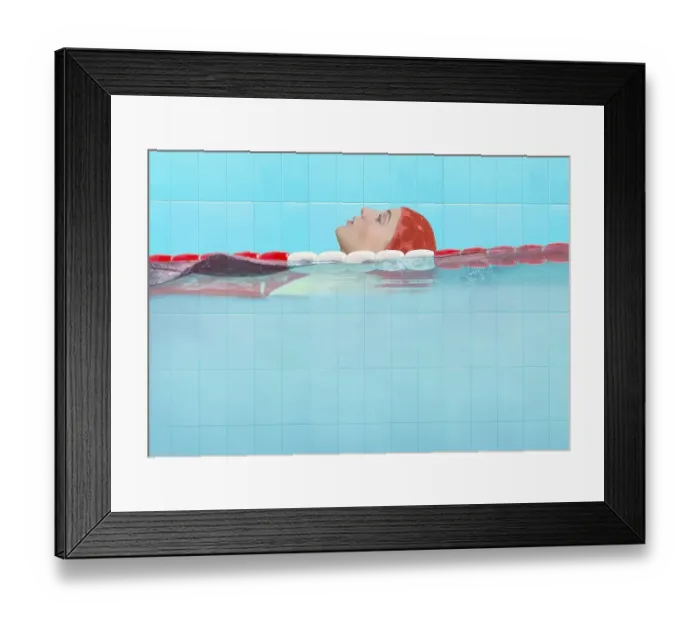 Framed Print : Young woman in an indoor swimming pool doing backstroke Framed Print : Young woman in an indoor swimming pool doing backstroke