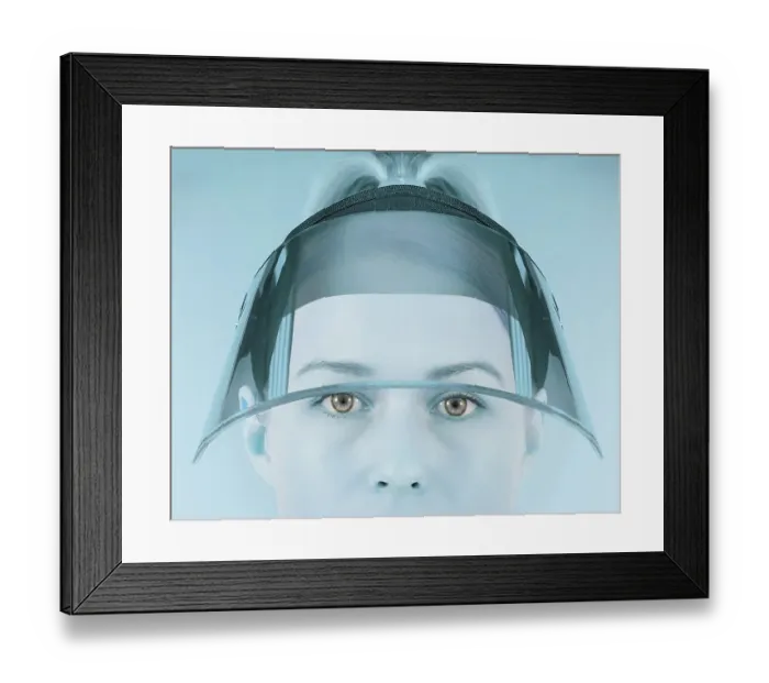 Framed Print : Portrait of a woman with a face shield